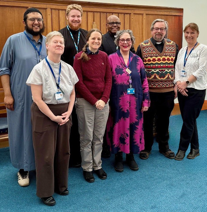people smiling in a chapel