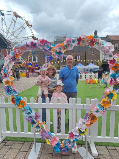 local family with heart floral installation