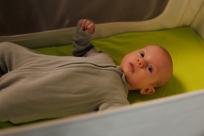 Baby in clear cot