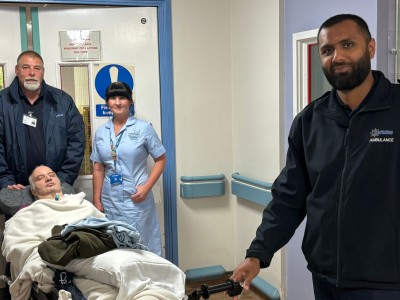 Photo of staff from NERAMS ambulance service, Janice from the Discharge Lounge and patient
