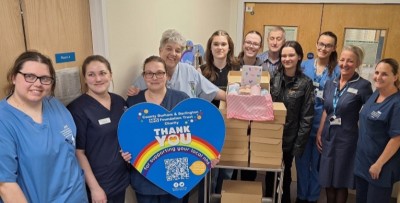 photo of ward staff with charitable donation
