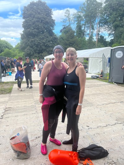 Two women in special swimming gear outside