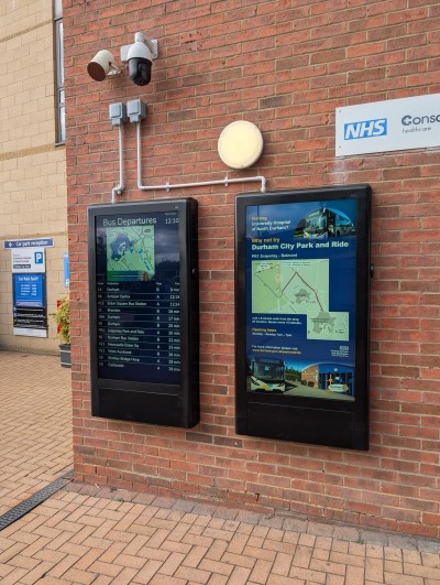 Digital screens showing live bus times