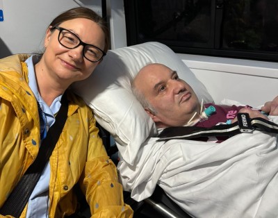 Photo of staff member and patient in ambulance