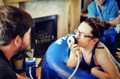 person in labour during water birth