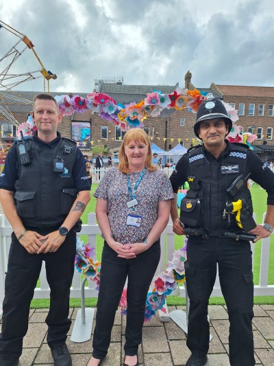Photo of two police officers with CDDFT stop smoking advisor